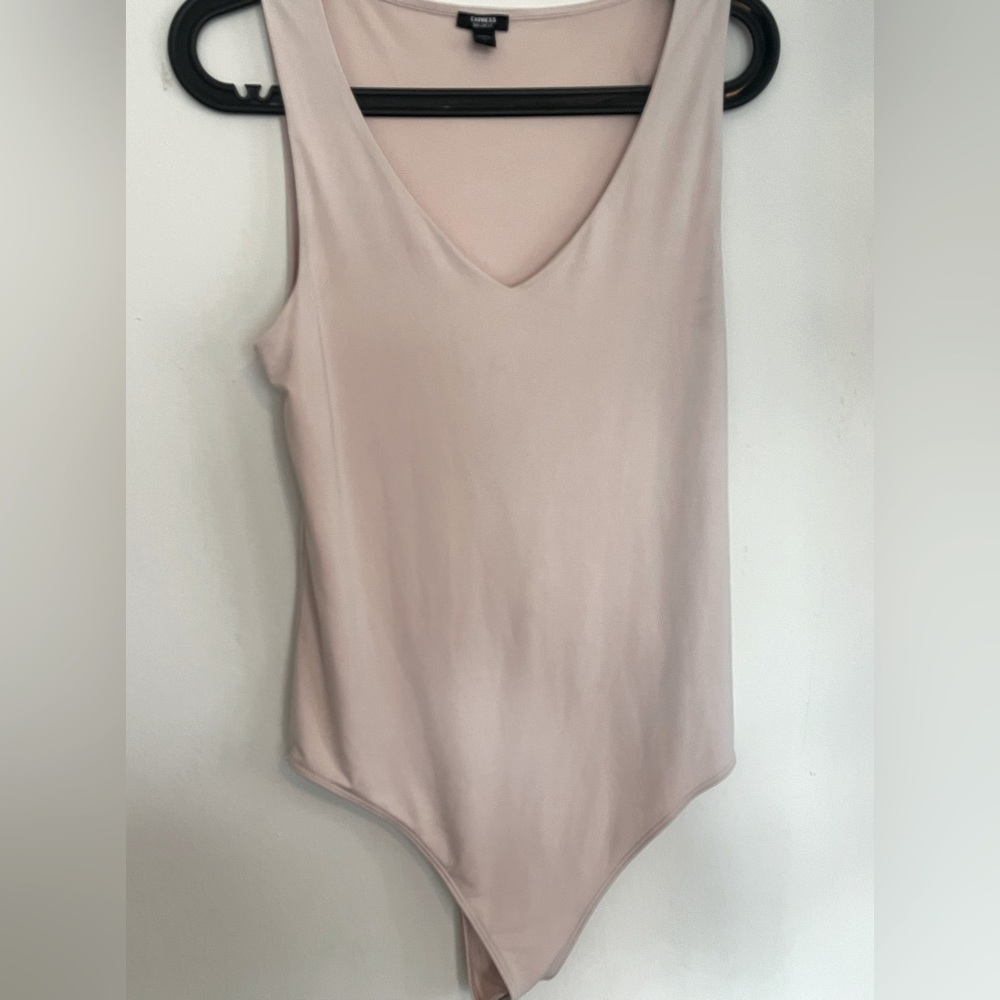 Light pink body suit